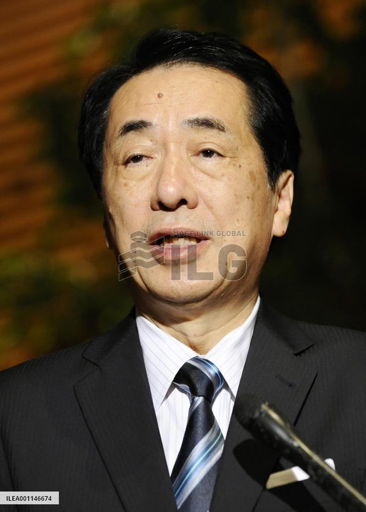 Kan speaks to reporters