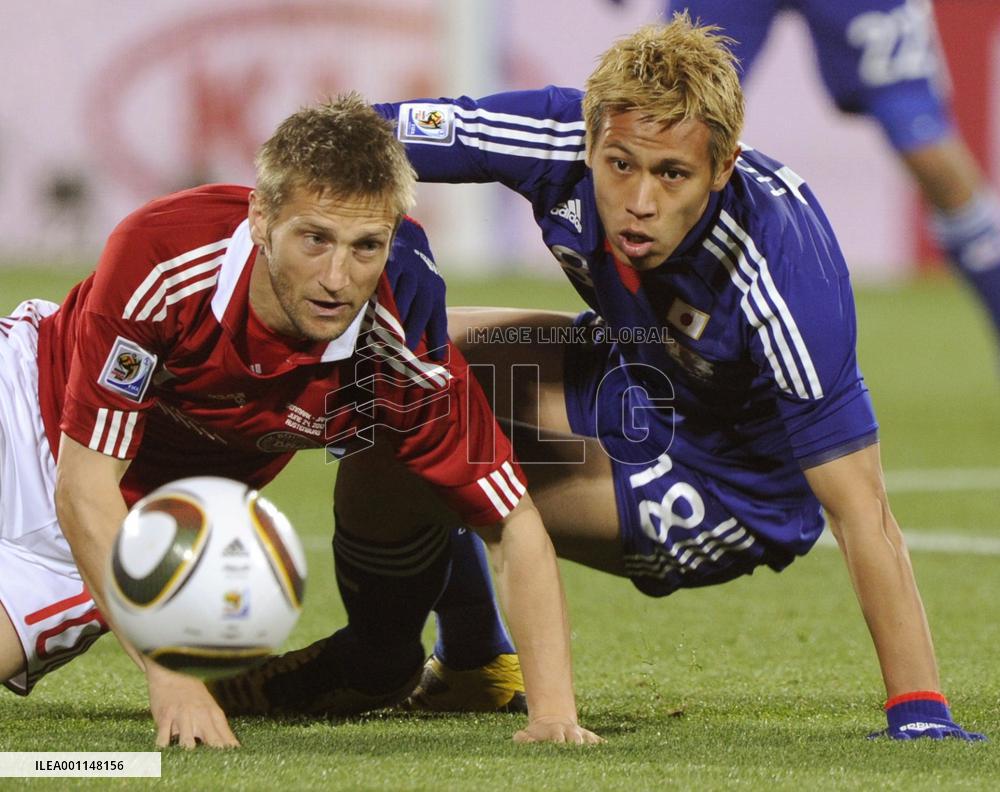 Japan overpower Denmark to cruise into last 16