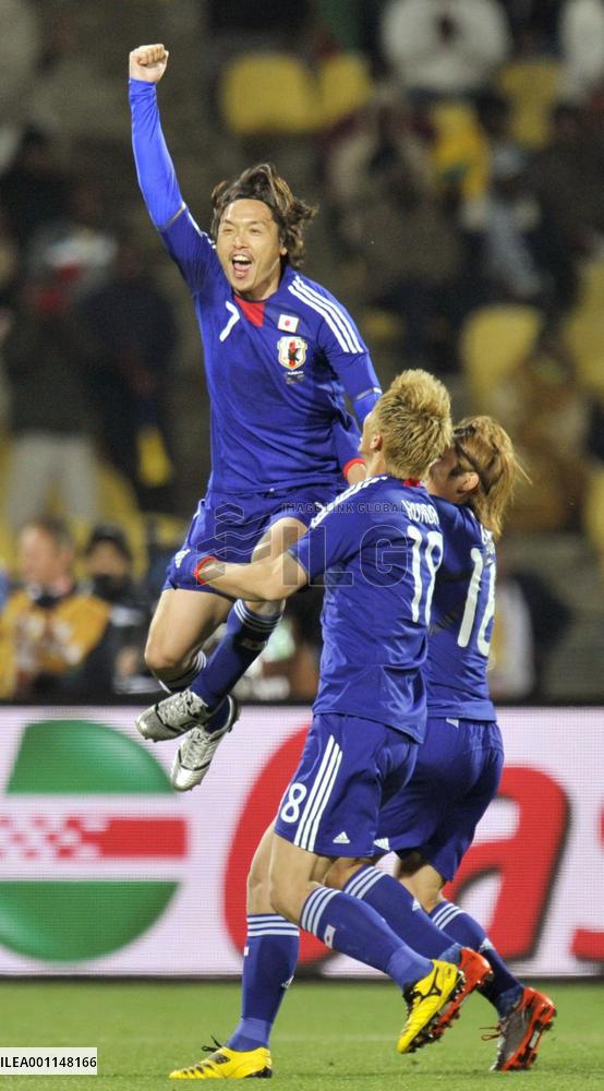 Japan overpower Denmark to cruise into last 16