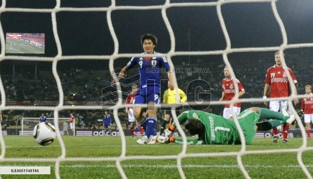 Japan overpower Denmark to cruise into last 16