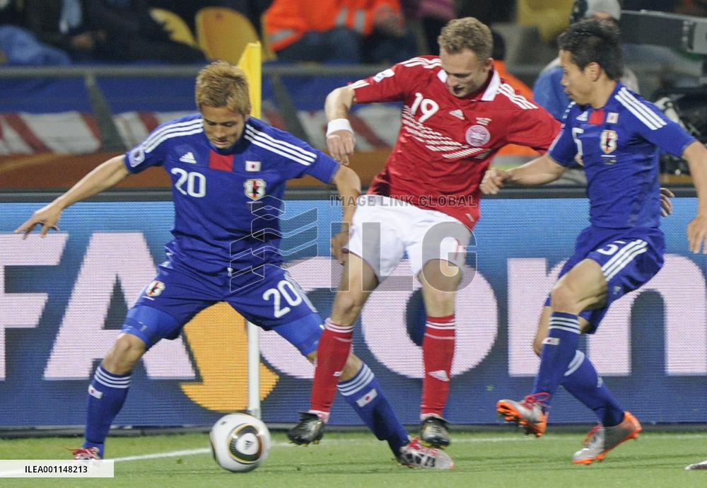 Japan overpower Denmark to cruise into last 16