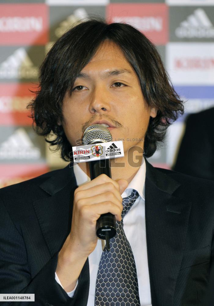 Japan's World Cup squad return home from South Africa