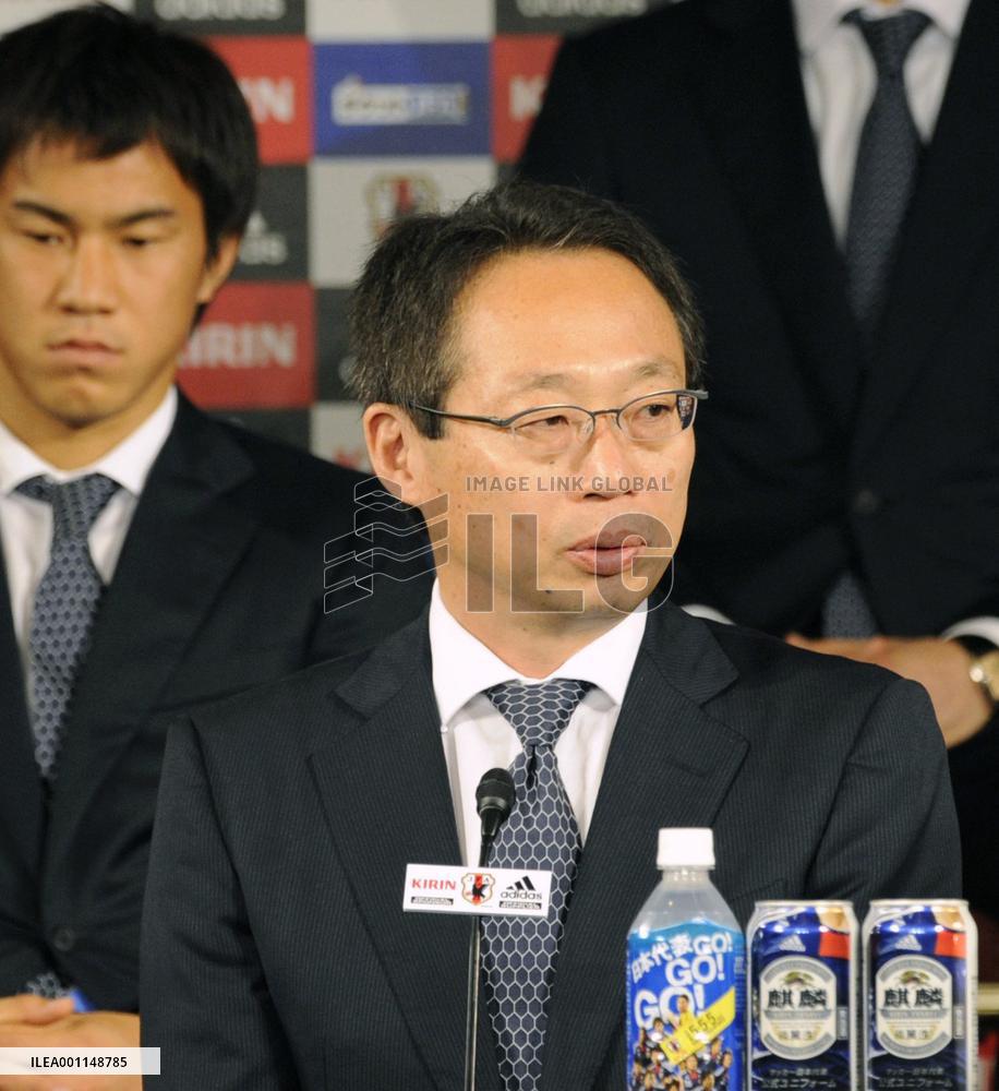 Japan's World Cup squad return home from South Africa