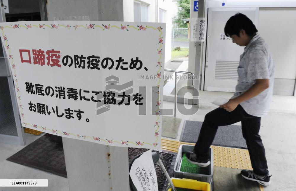 Voting under way in Japan's 1st election since change of gov't