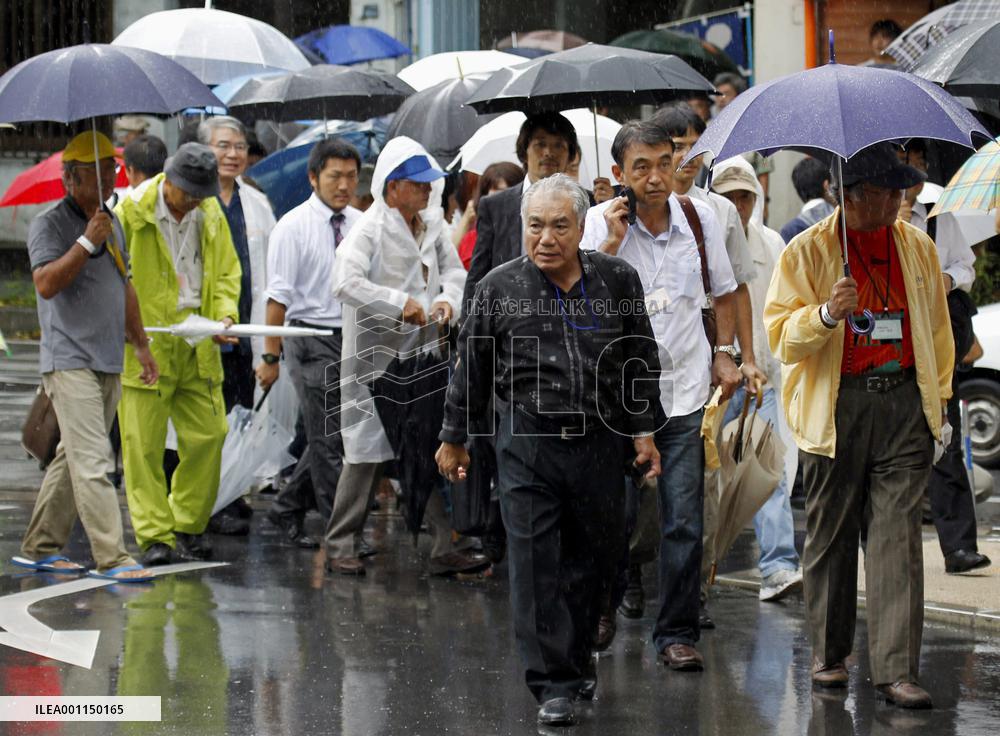 Court ups compensation over Futenma base