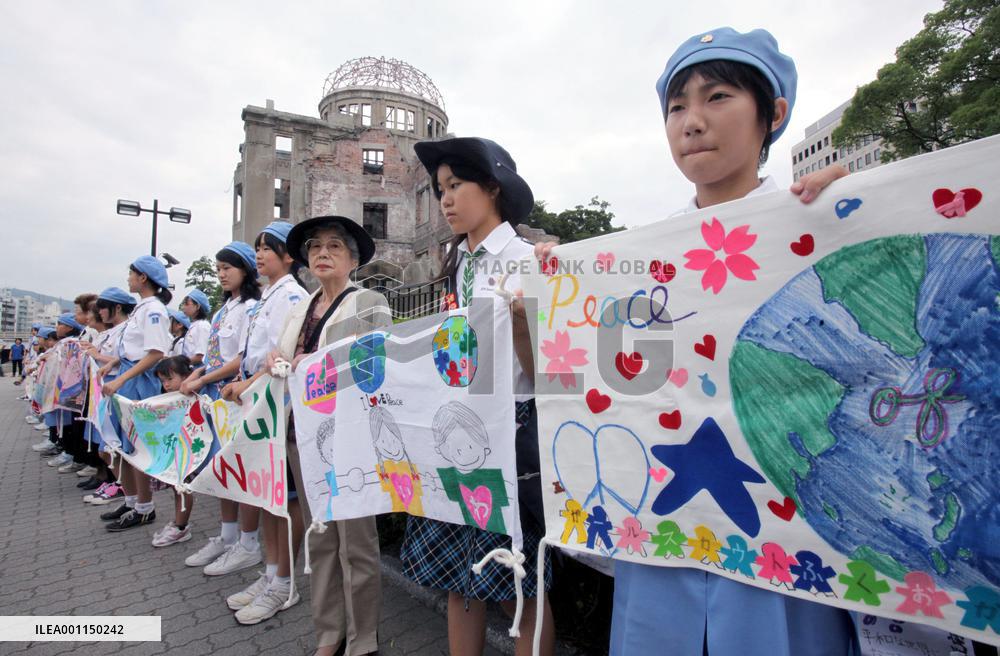 Banners for peace encircle A-Bomb Dome in Hiroshima