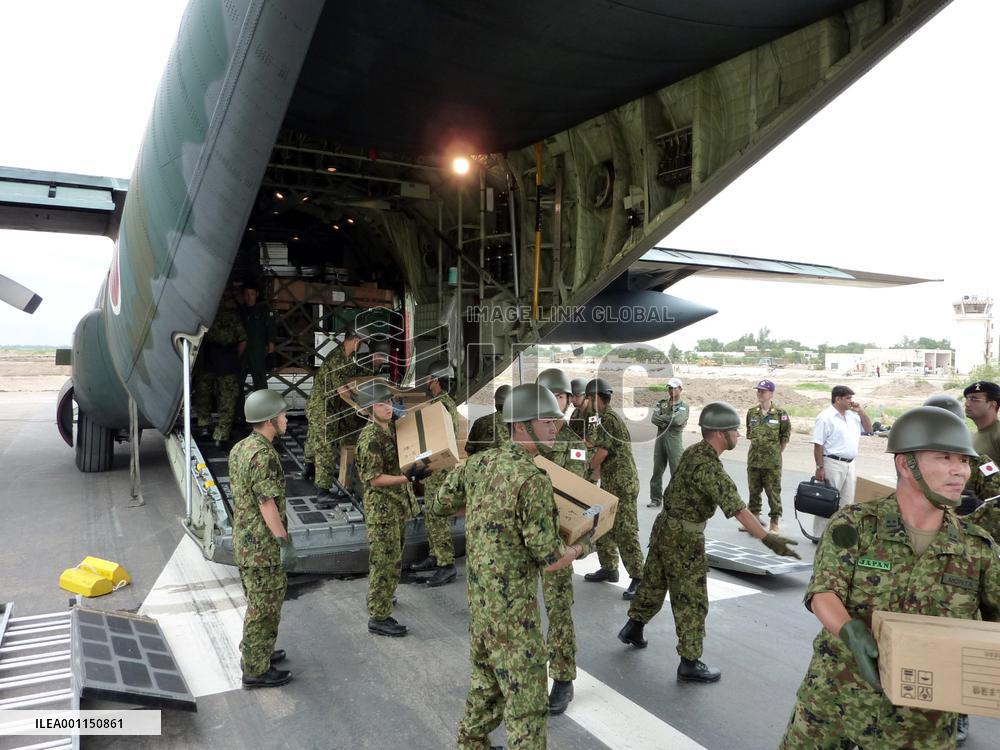 SDF members at airbase in flood-hit Pakistan