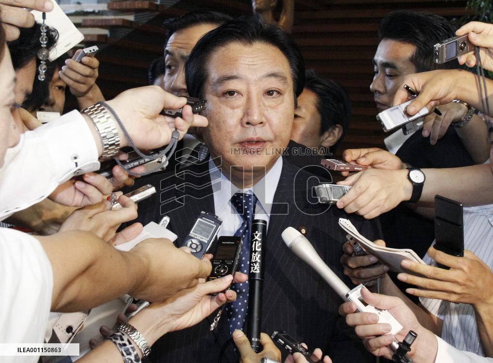 Finance Minister Noda speaks to reporters