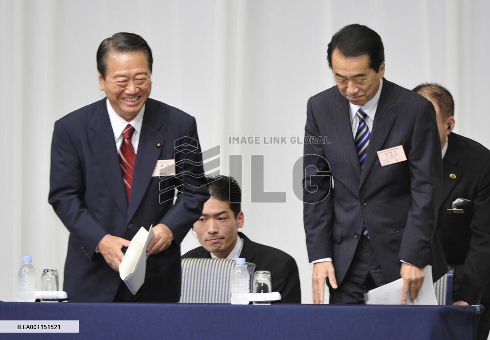 Kan keeps power beating Ozawa in election