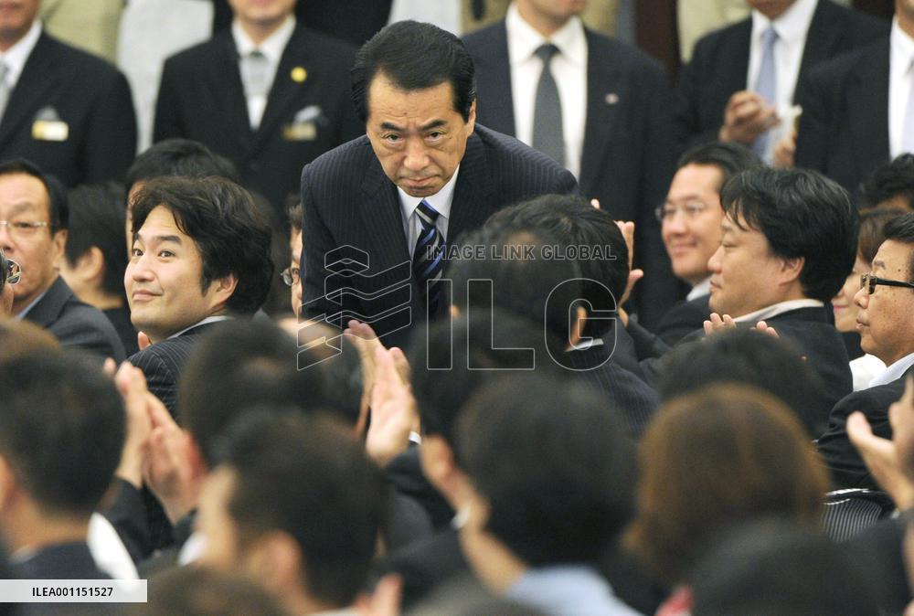 Kan reelected as leader of governing party