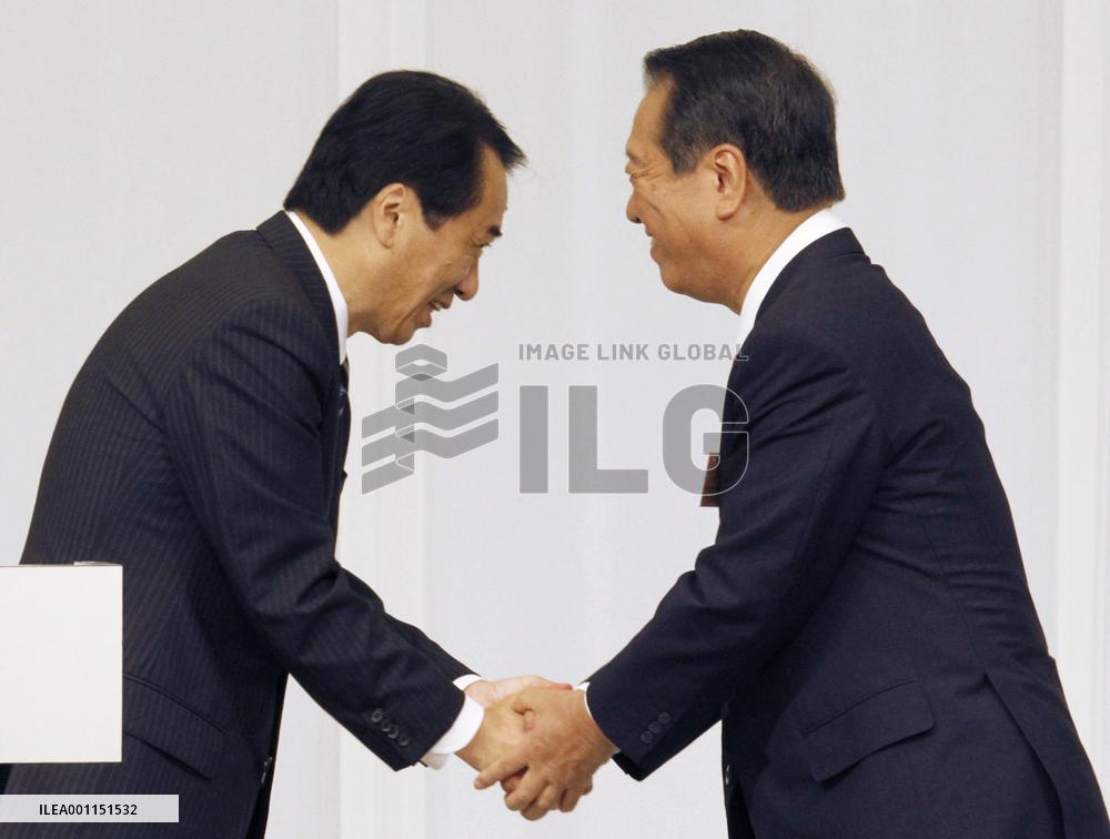 Kan keeps power beating Ozawa in election