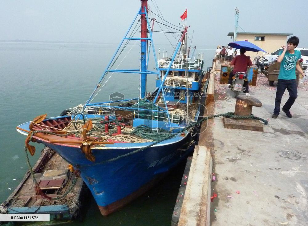 Chinese fishing boat returns home after collision