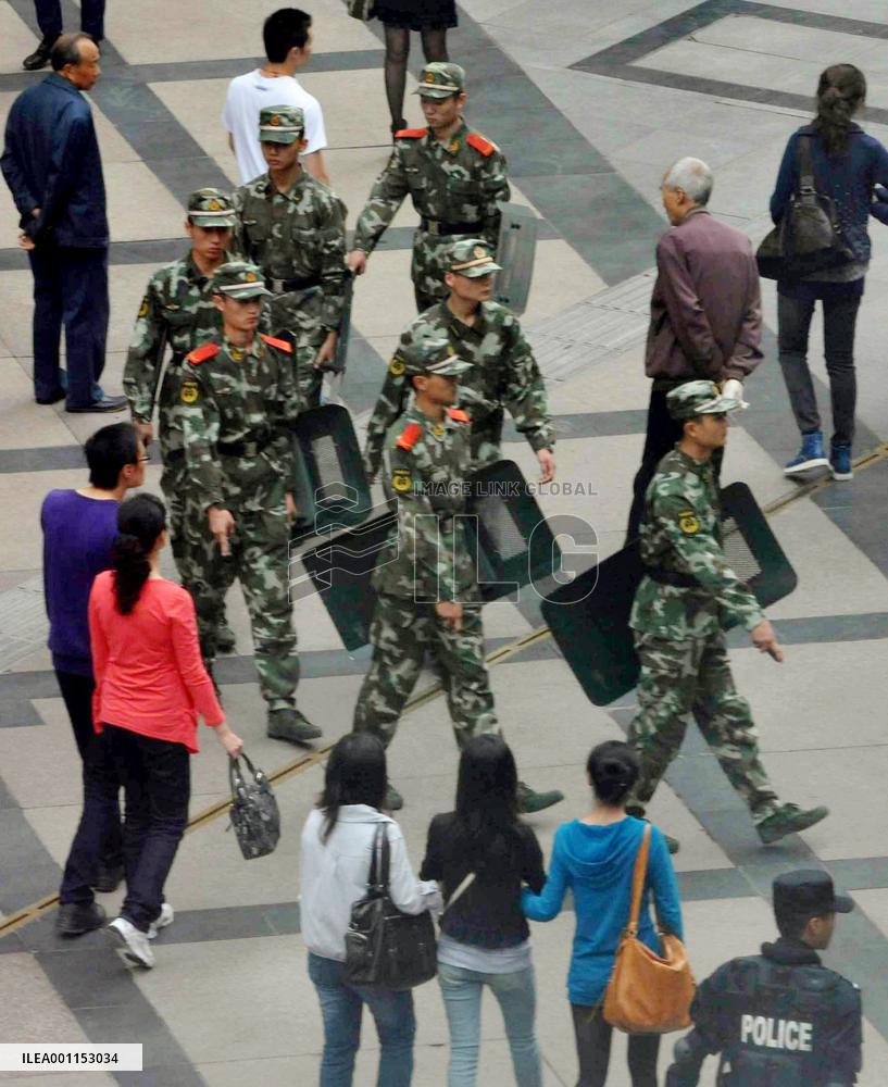 Chinese police patrol near Ito-Yokado in China's Chengdu