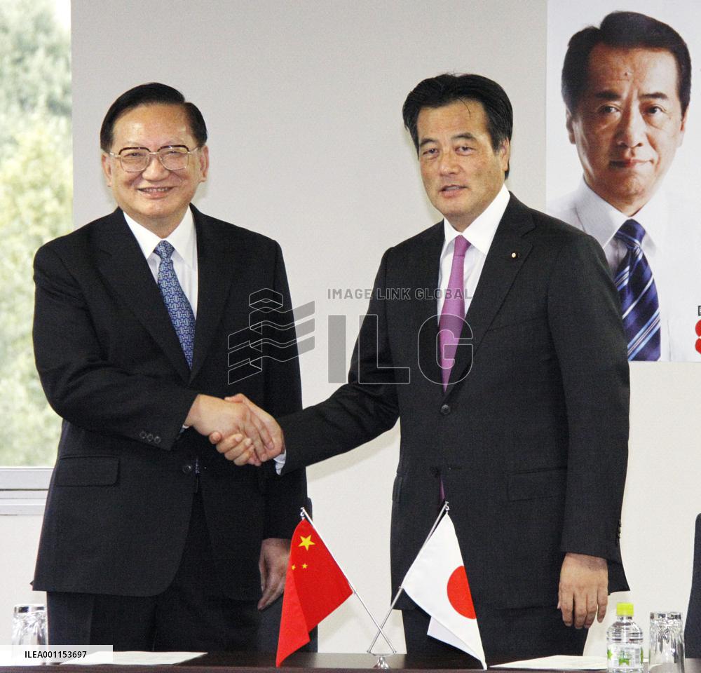 Okada, Tang meet in Tokyo