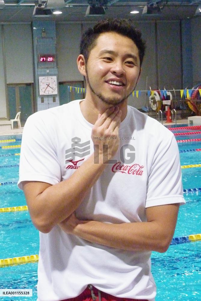 Japanese swimmer Kitajima works out