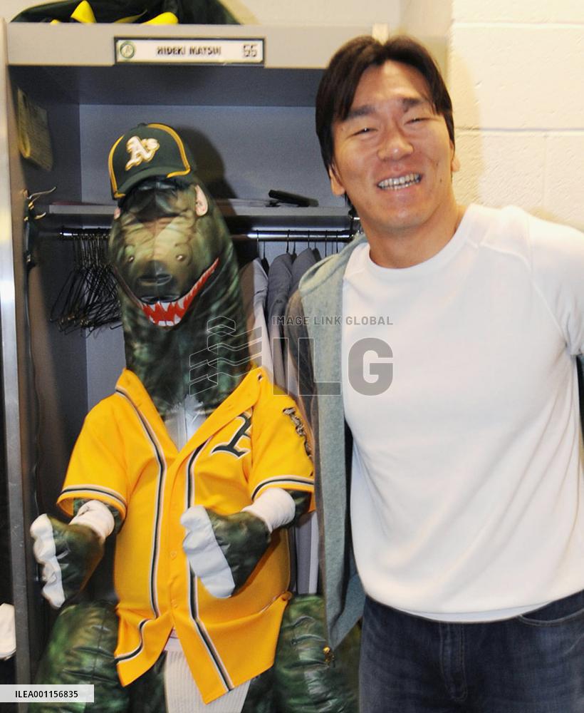 A's welcome Matsui with Godzilla figure