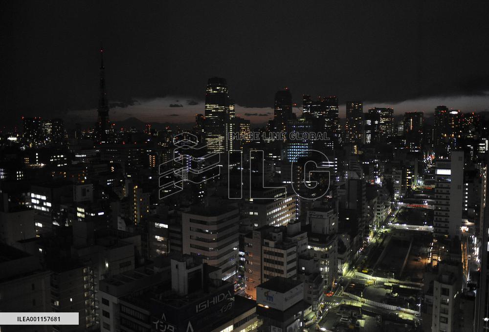 Lights turned down in Tokyo on blackout warning