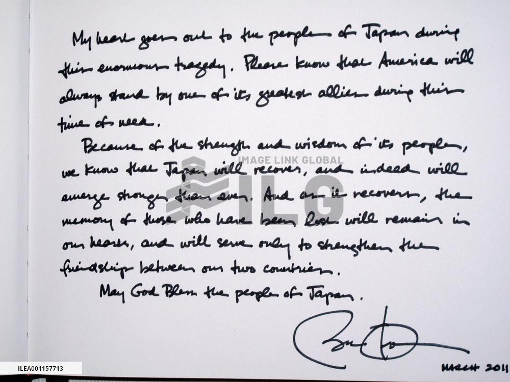 Obama signs condolence book
