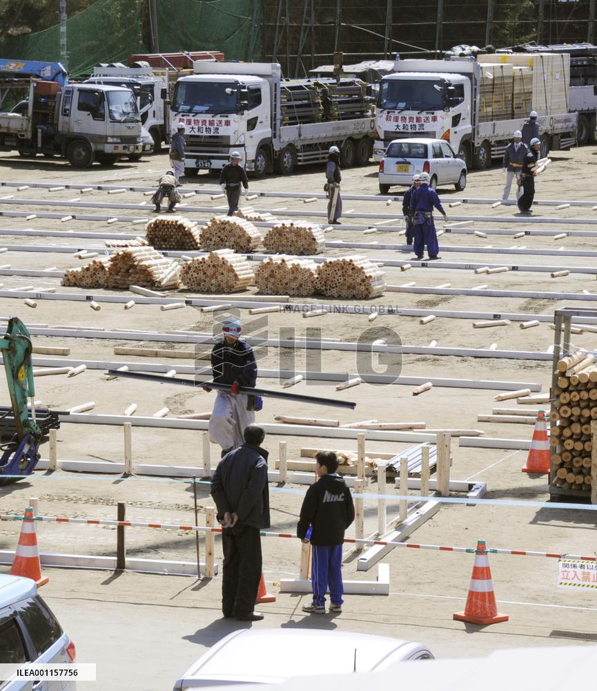 Construction of temporary housing starts in quake-hit city
