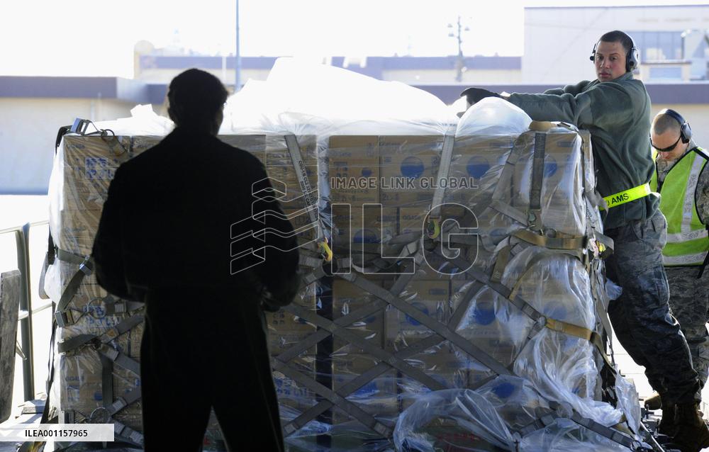 U.S. forces transport water to quake-hit areas