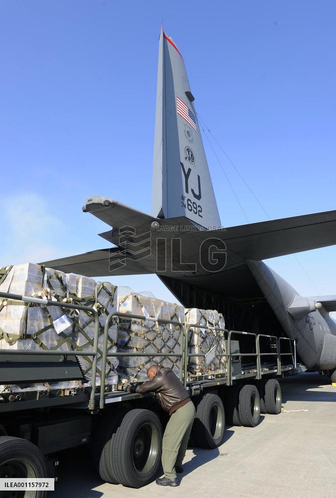 U.S. forces transport water to quake-hit areas