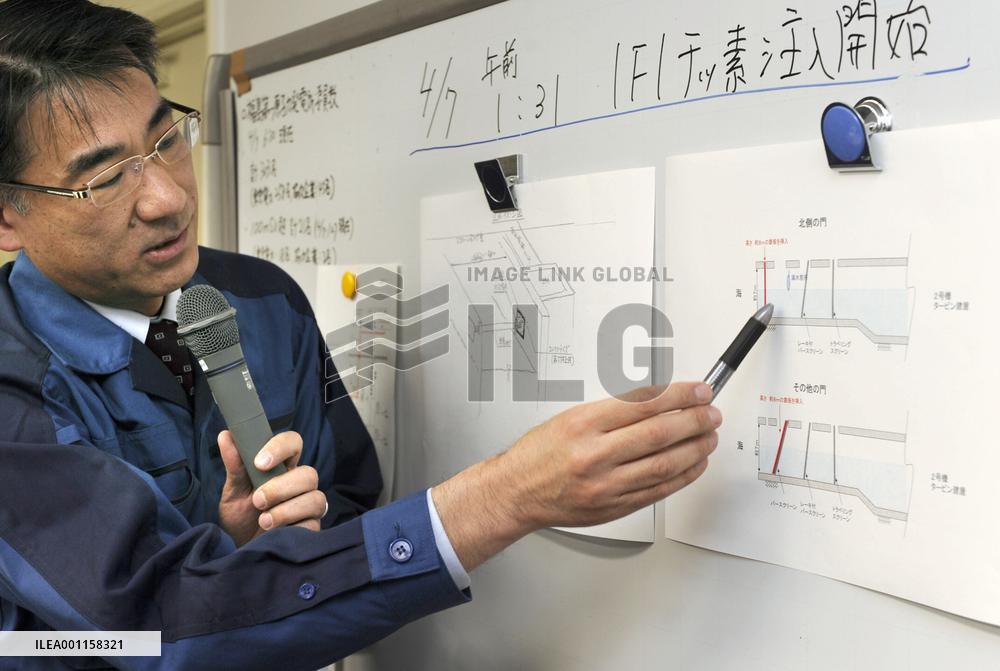 TEPCO official at press conference