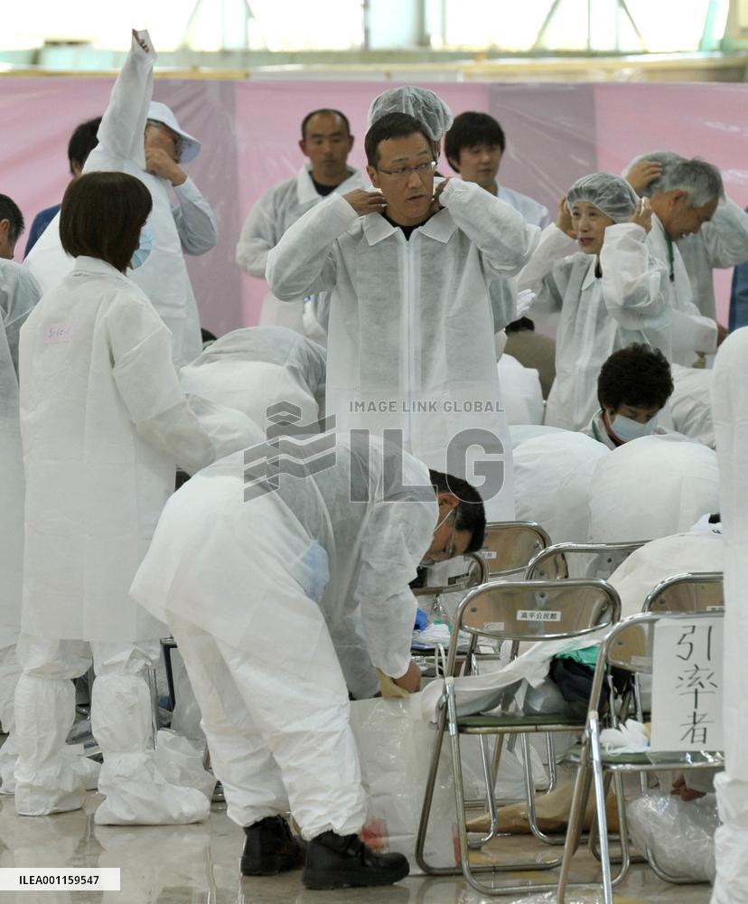 Nuclear evacuees briefly return home