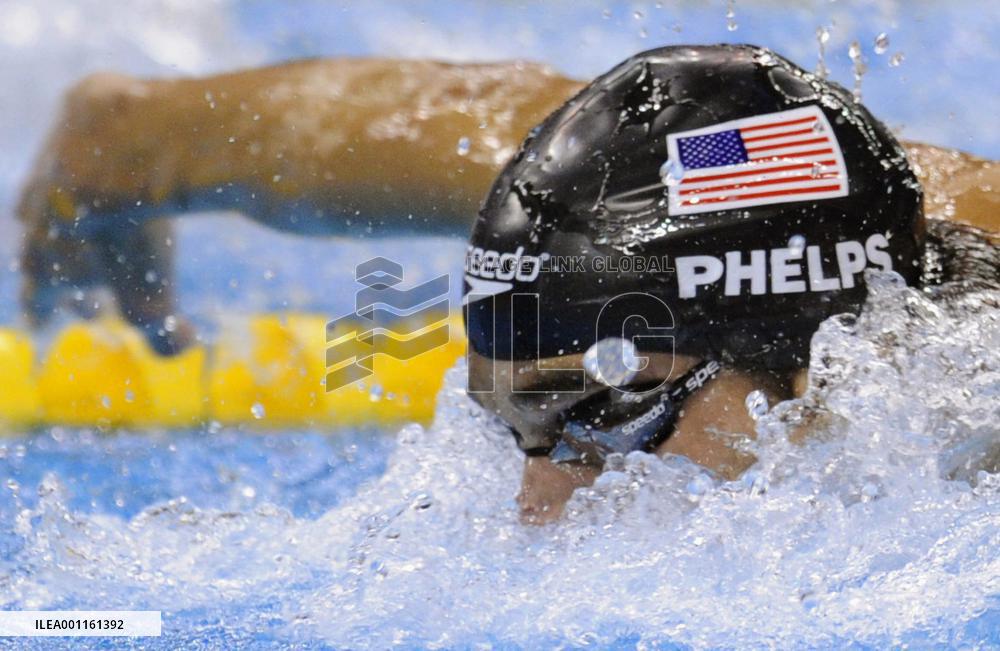 Phelps wins 100 butterfly