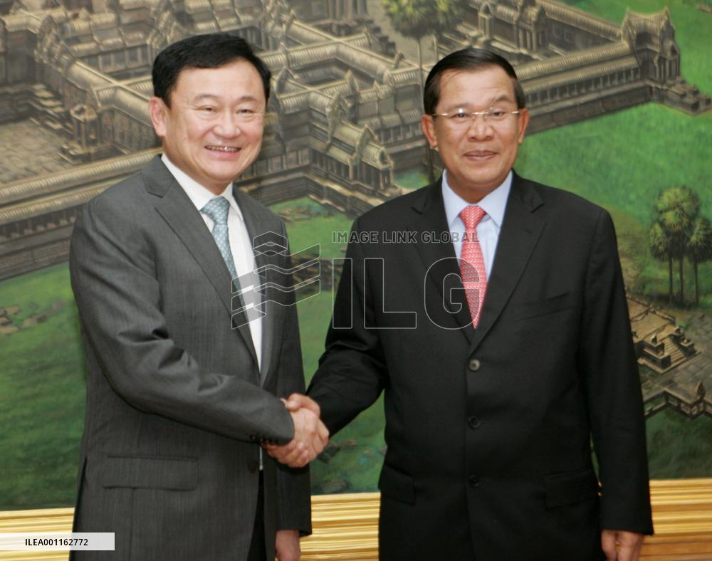 Fugitive ex-Thai premier holds talks with Cambodia's Hun Sen