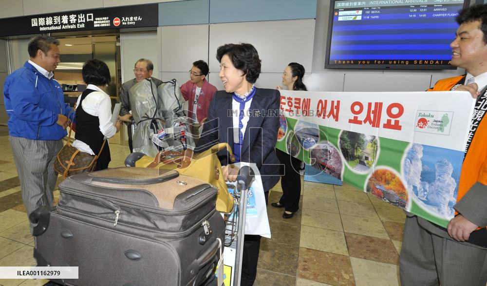 Tsunami-hit Sendai Airport reopens