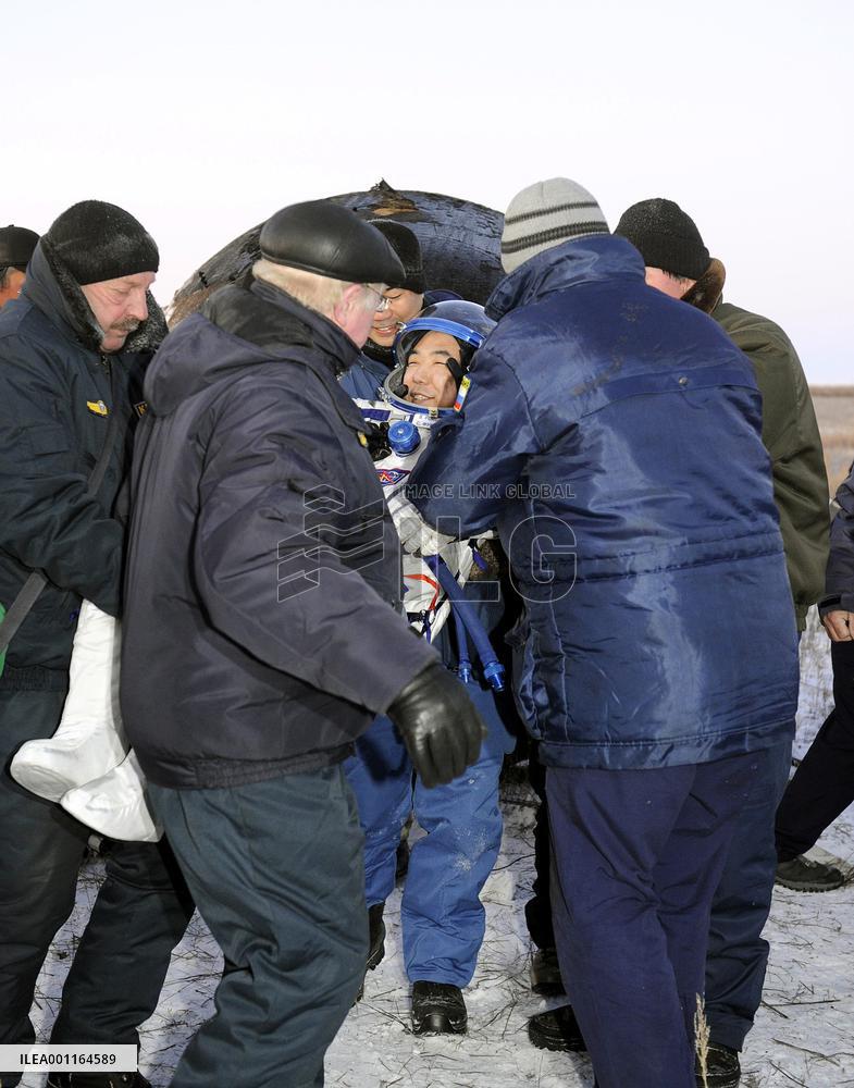 Astronauts return to Earth