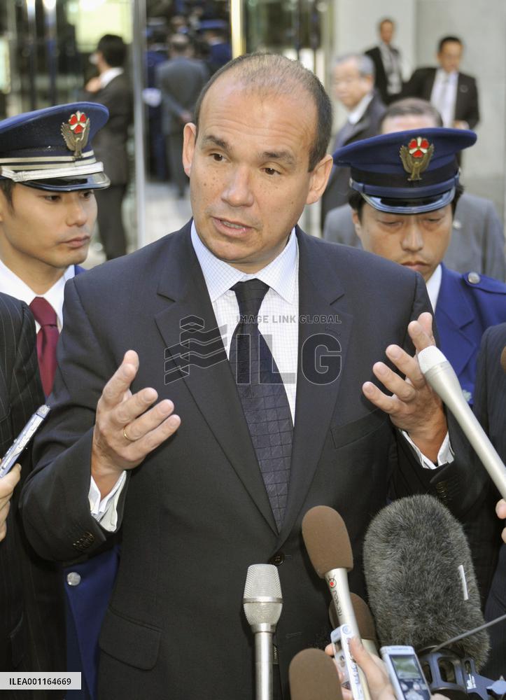 Ex-Olympus chief Woodford attends board meeting