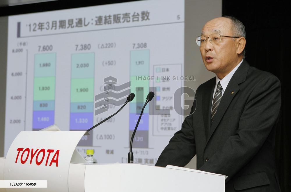 Toyota halves FY 2011 net profit forecast
