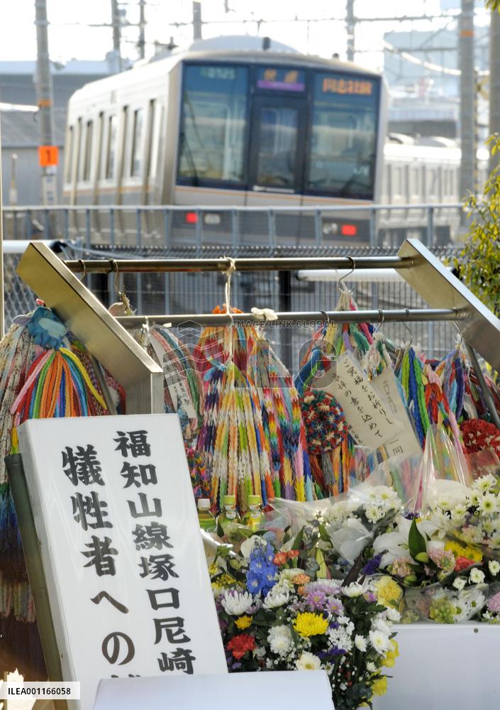 Flowers laid at 2005 fatal train derailment site