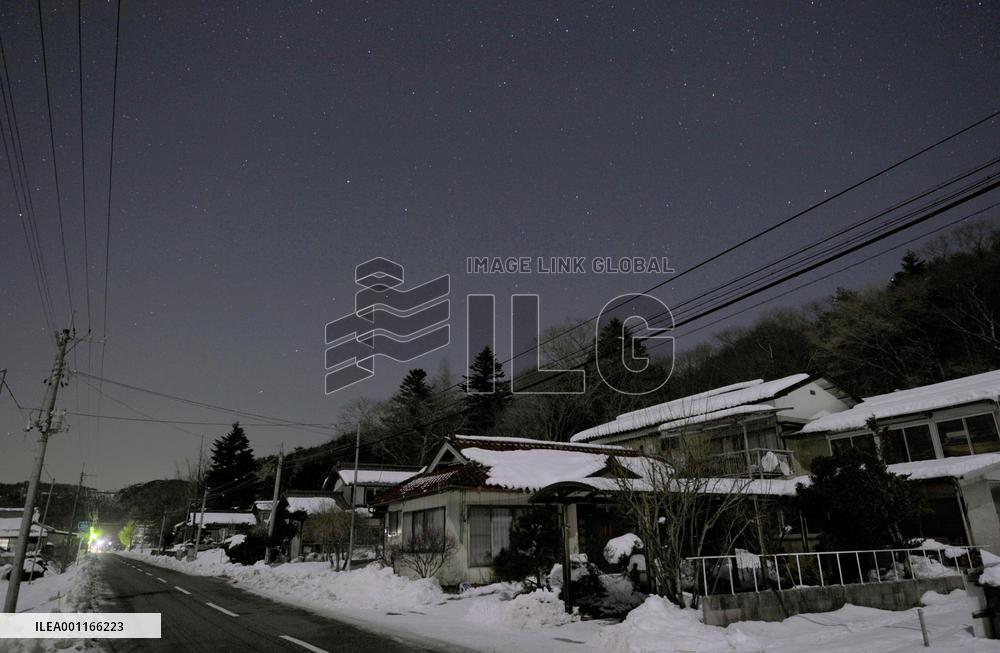 Fukushima village calls on evacuees to return home