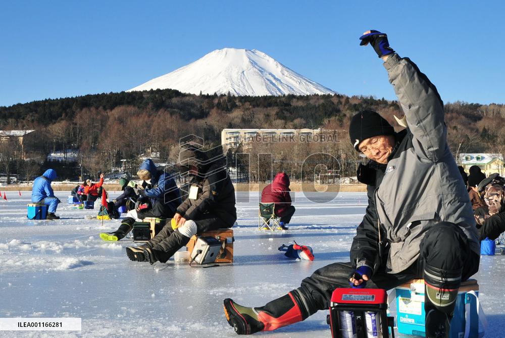 Ice fishing on Lake Yamanaka Imagelinkglobal ILG Product