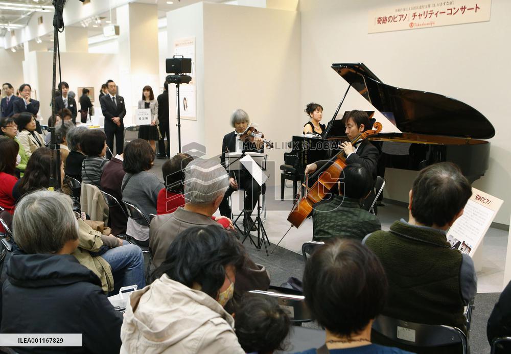 Concert using tsunami-damaged piano