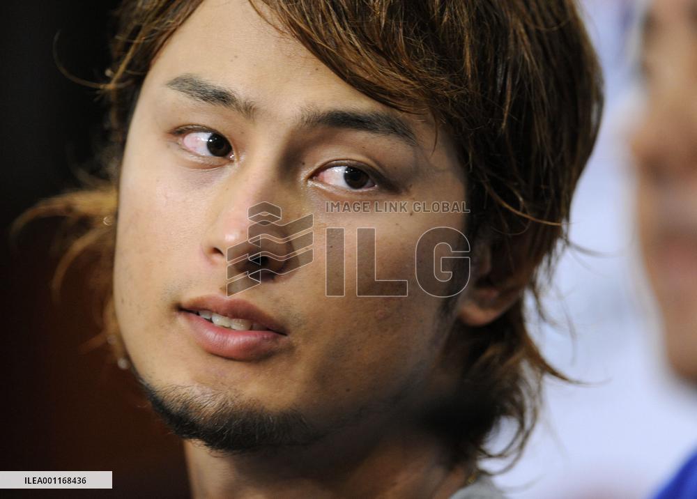 Darvish wins major league debut