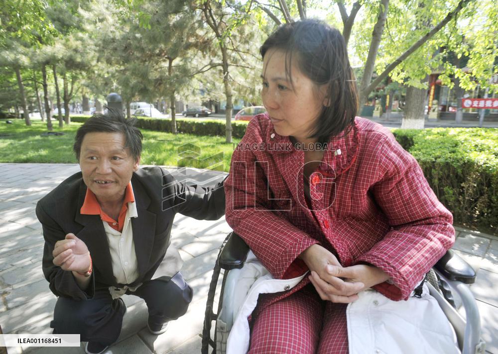 Chinese court imprisons activist couple