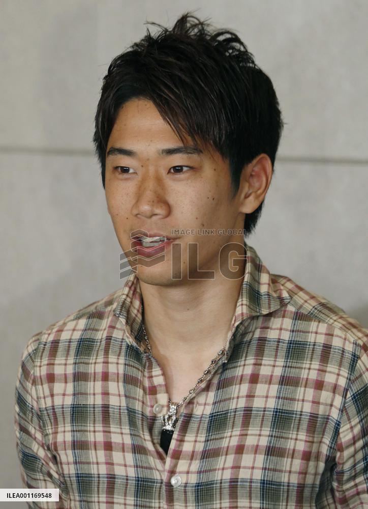 Kagawa returns home