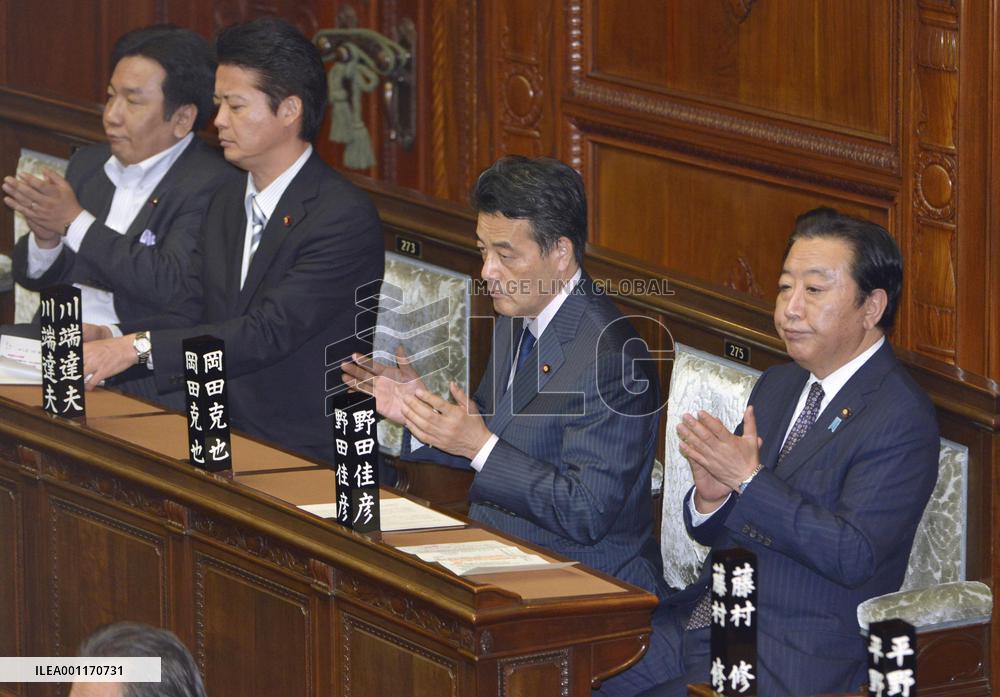 Japan's lower house OKs sales tax hike legislation
