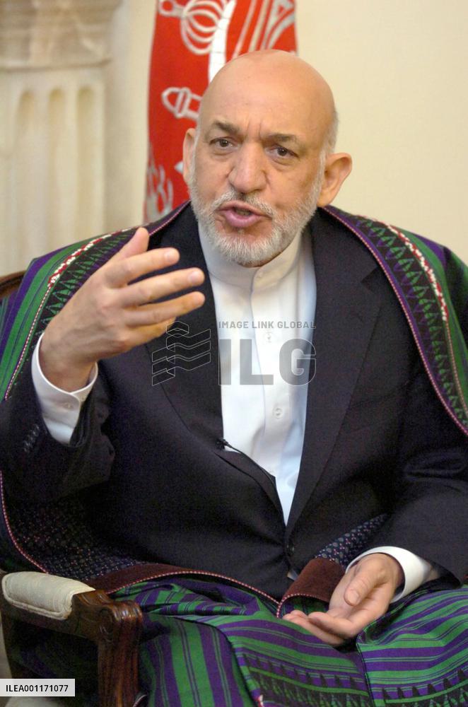 Karzai hopes Kyoto meet will lead to talks with Taliban