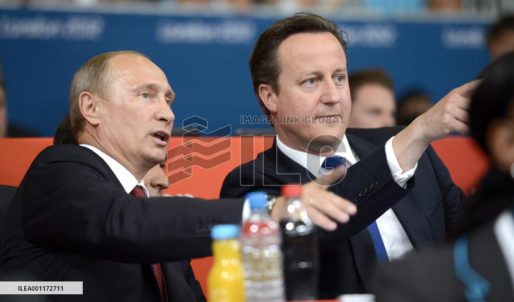 Cameron, Putin visit Olympic judo venue in London