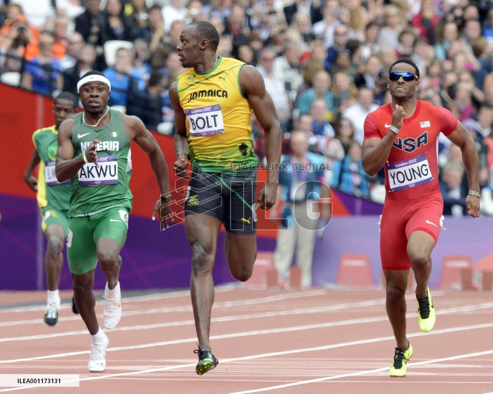 Jamaica's Bolt cruises into men's 200-meter semifinals