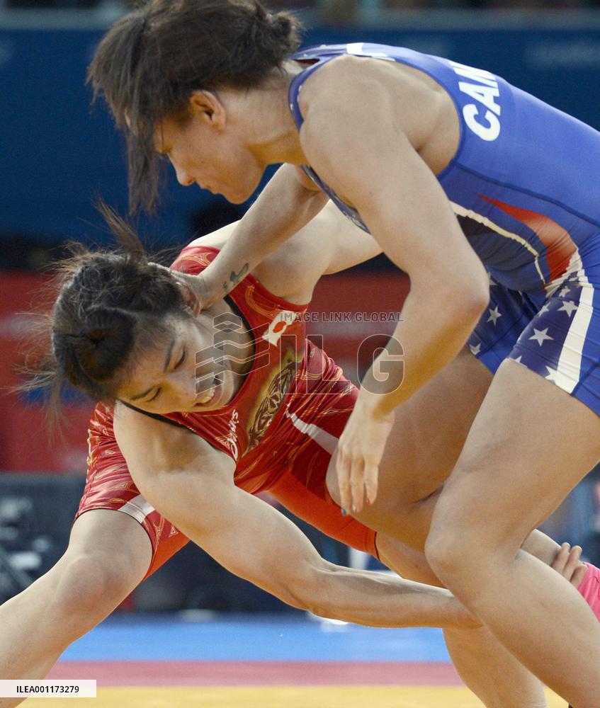 Yoshida snatches 3rd Olympic title