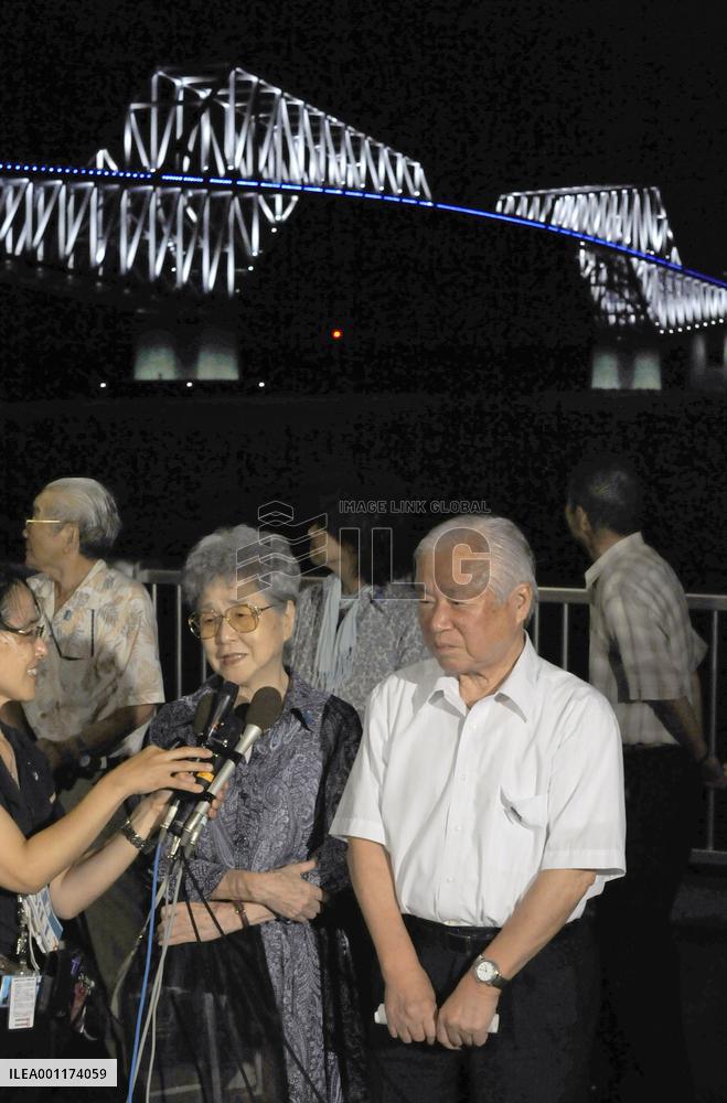 Tokyo Gate Bridge lit up in blue in hope for rescue of abductees