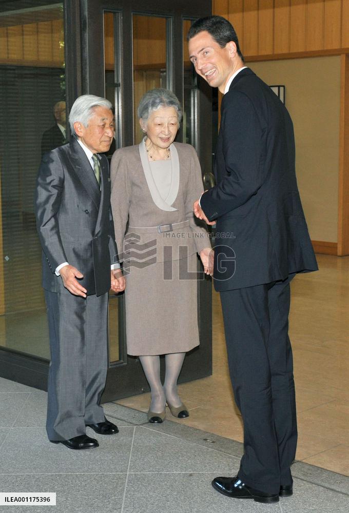 Japan emperor, empress greets