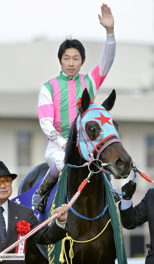 Take, Sadamu Patek win Mile Championship