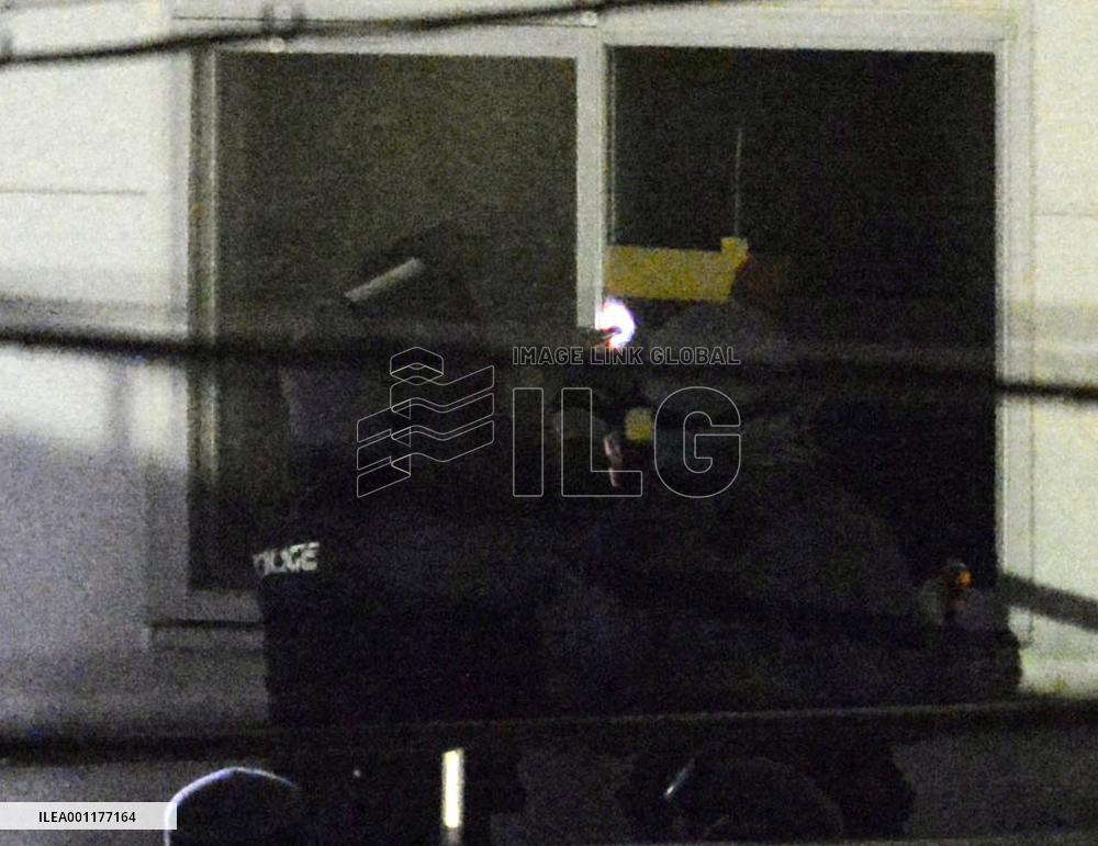 Man arrested in Aichi bank standoff, all hostages released