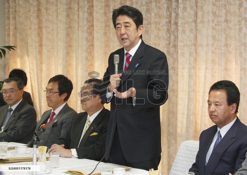 Abe aims to boost Japan economy with tax reforms